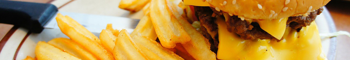 Eating American (Traditional) Burger Diner at KirbyG’s® Diner restaurant in McDonough, GA.